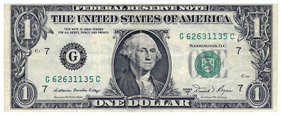 US Dollar Bill And Exchange Rates With UK Pounds